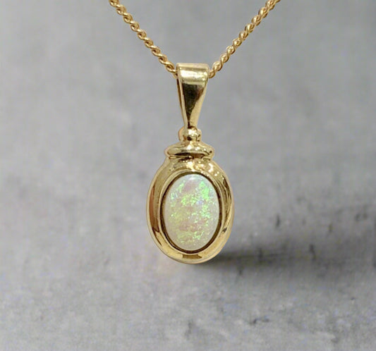 Opal yellow gold oval rubbed over necklace