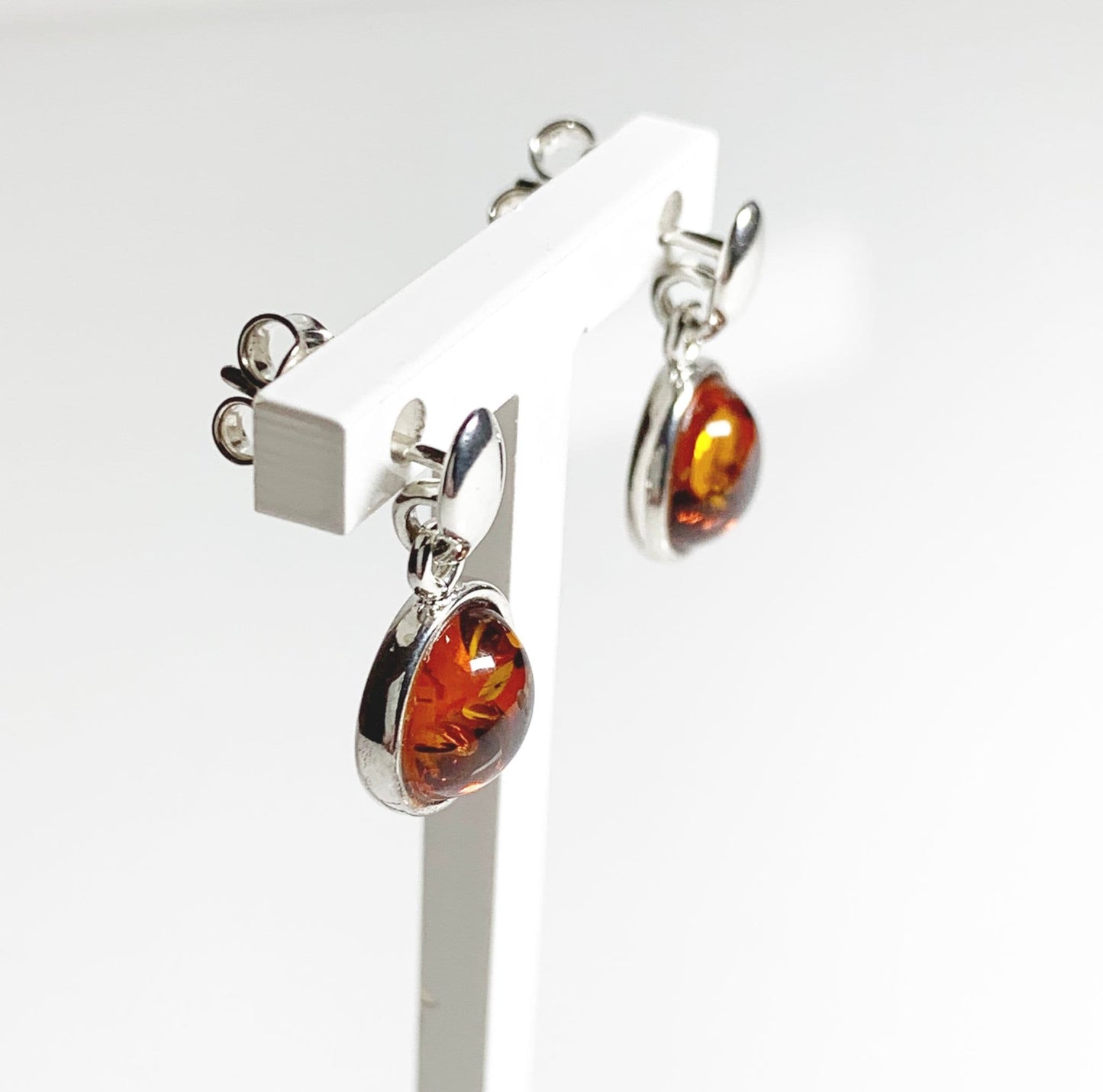 Orange amber round drop sterling silver earrings