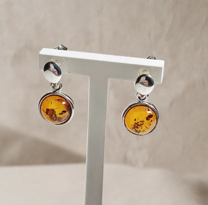 Orange amber round drop sterling silver earrings