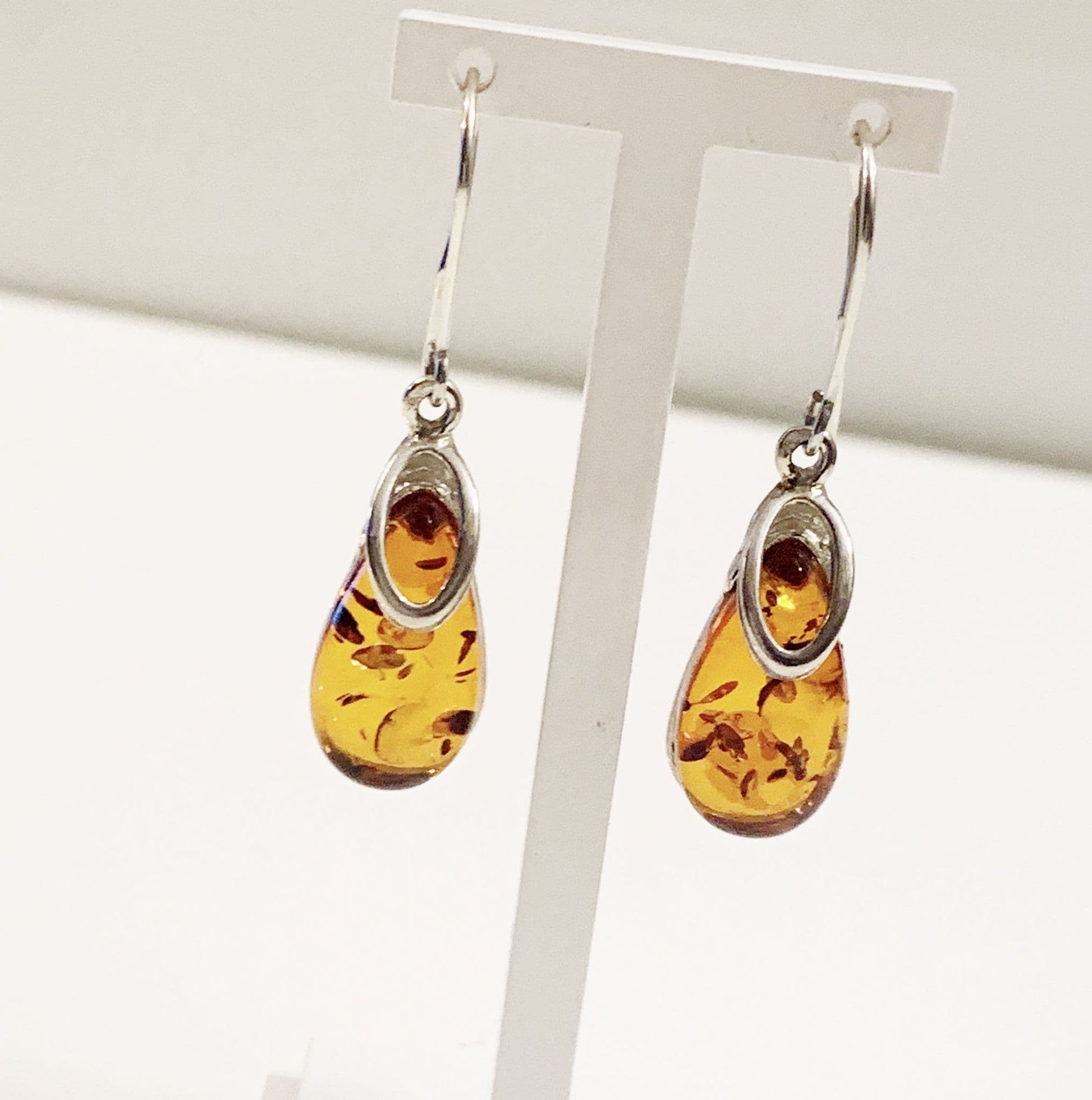 Orange amber tear drop sterling silver earrings