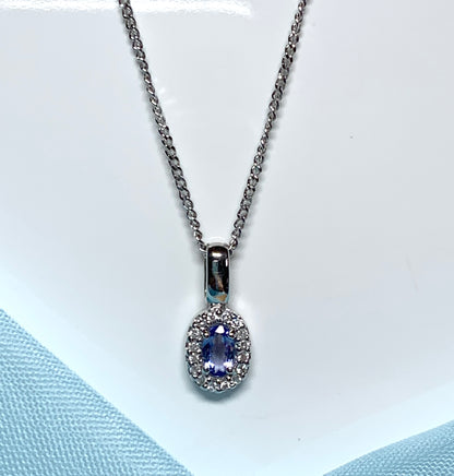 Oval cluster tanzanite and diamond white gold necklace