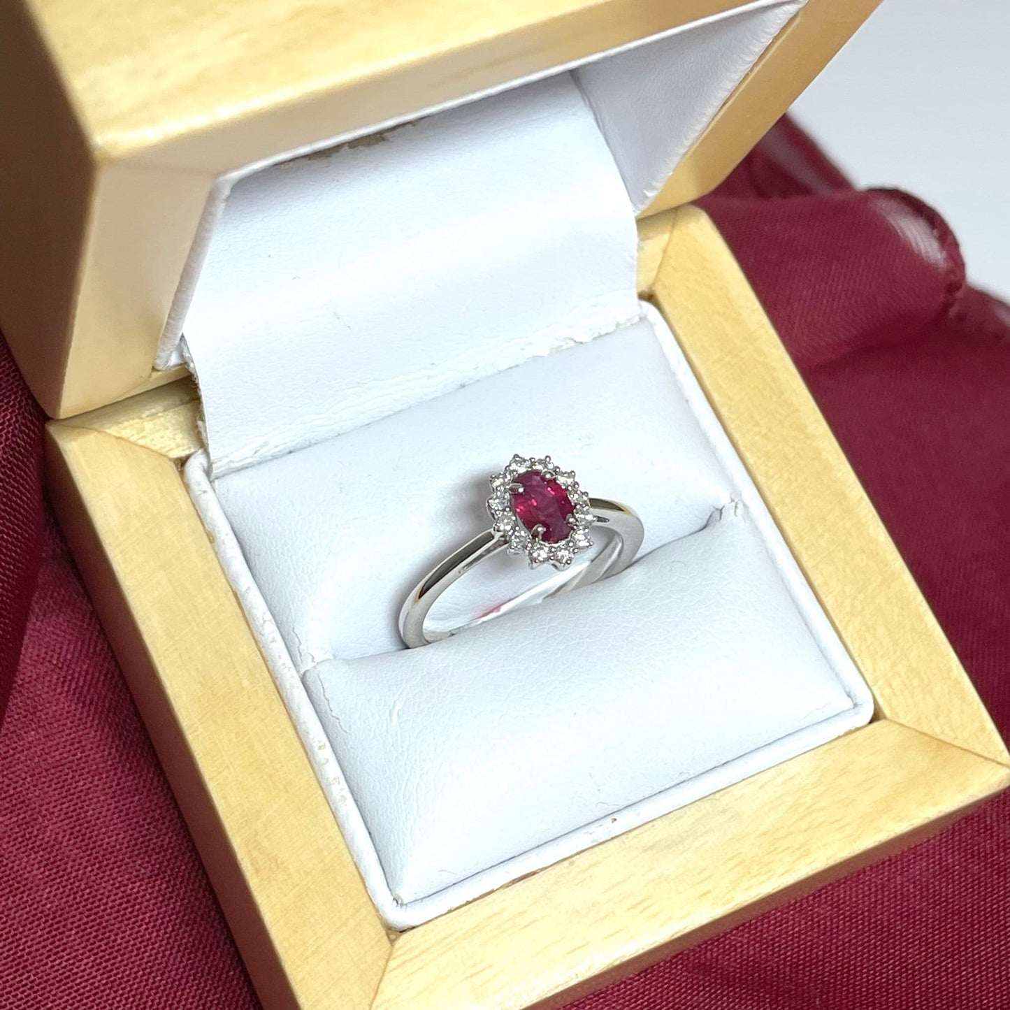 Oval Ruby Red and Diamond White Gold Cluster Ring