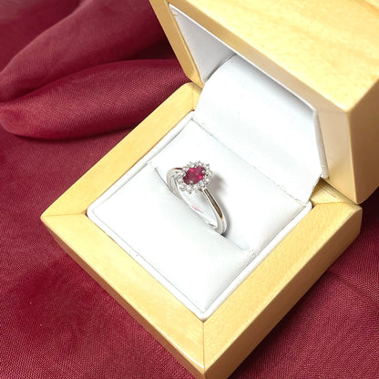 Oval Ruby Red and Diamond White Gold Cluster Ring