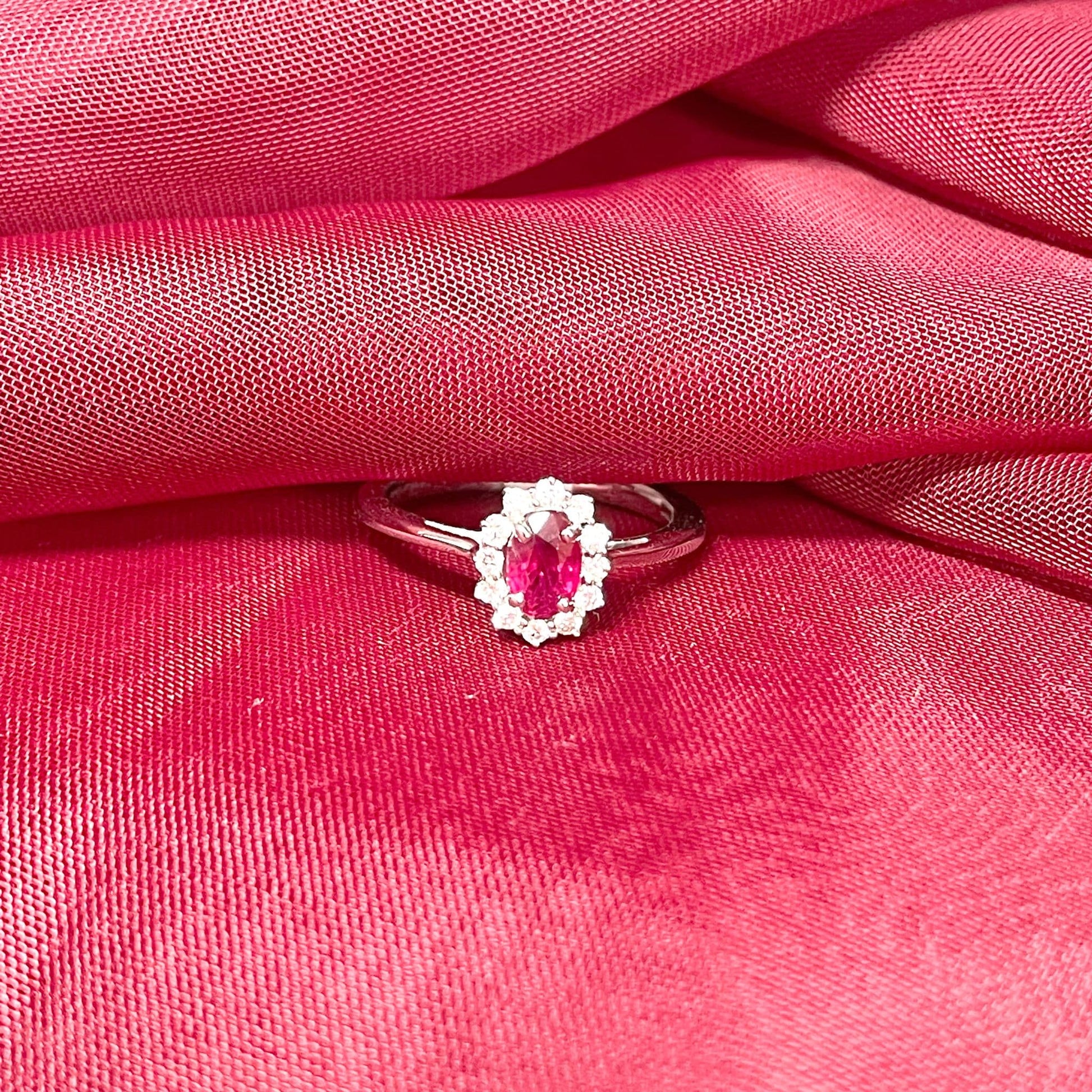 Oval Ruby Red and Diamond White Gold Cluster Ring