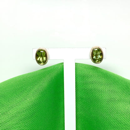 Oval Shaped Peridot Yellow Gold Stud Earrings