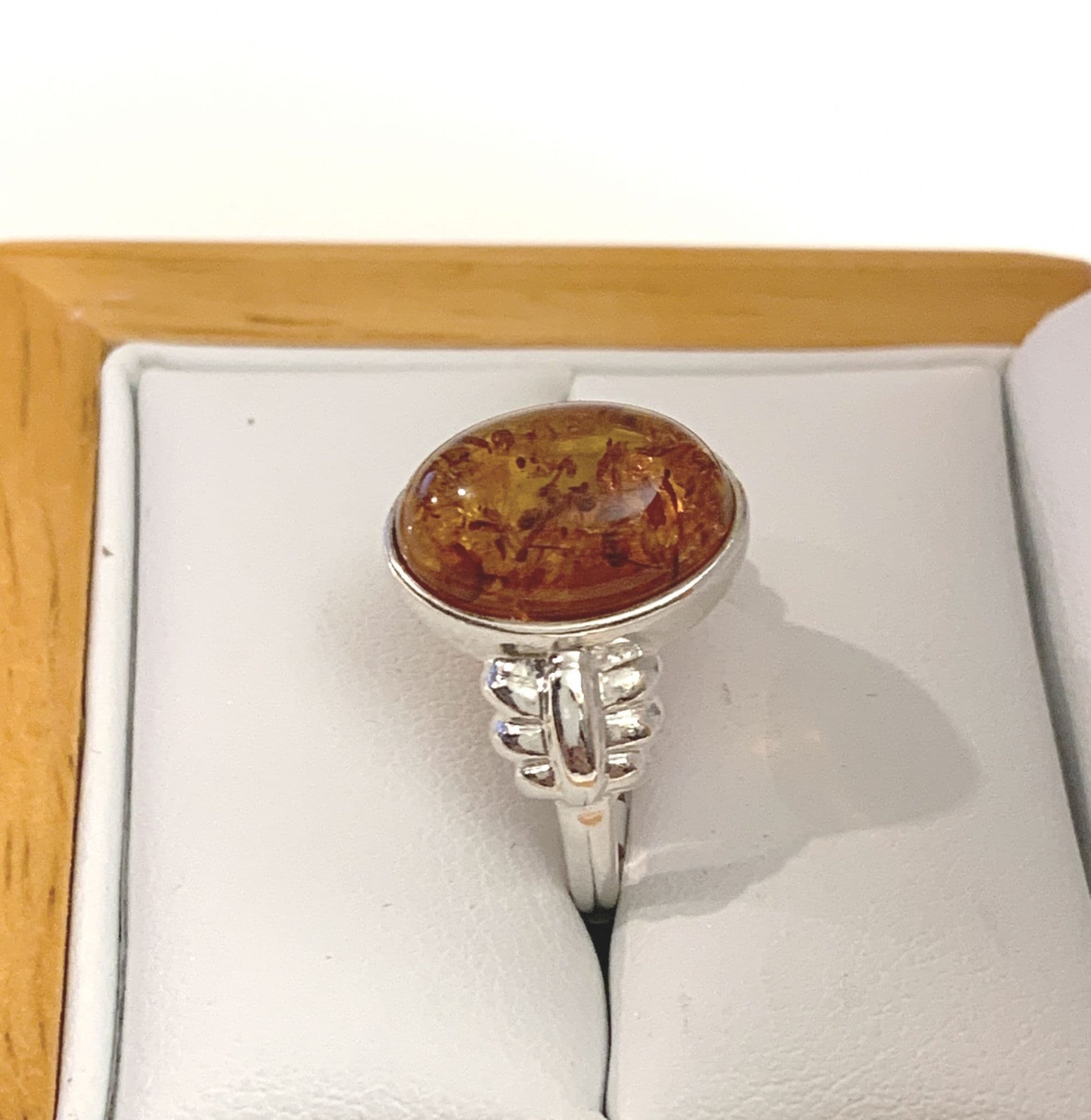 Oval Sterling Silver Orange Amber Ring Fancy Shoulders