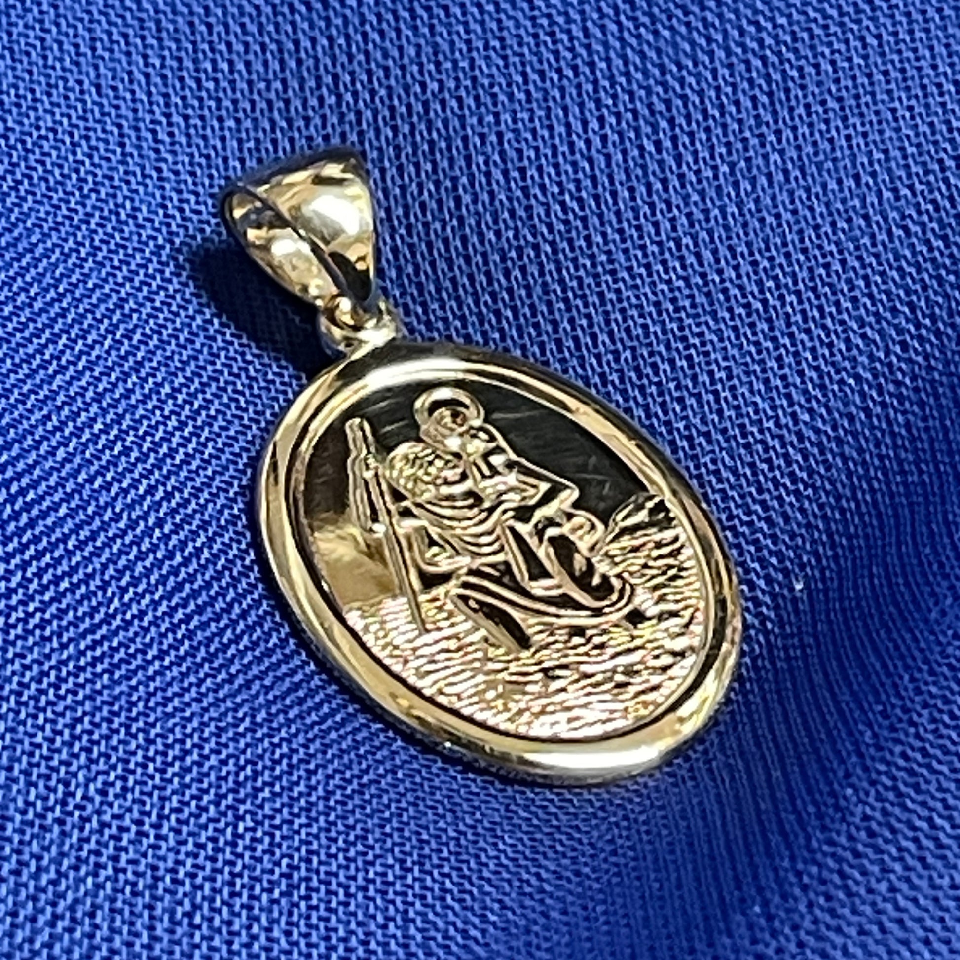 Oval St. Christopher solid 9 carat yellow gold