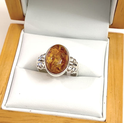 Oval Sterling Silver Orange Amber Ring Fancy Shoulders