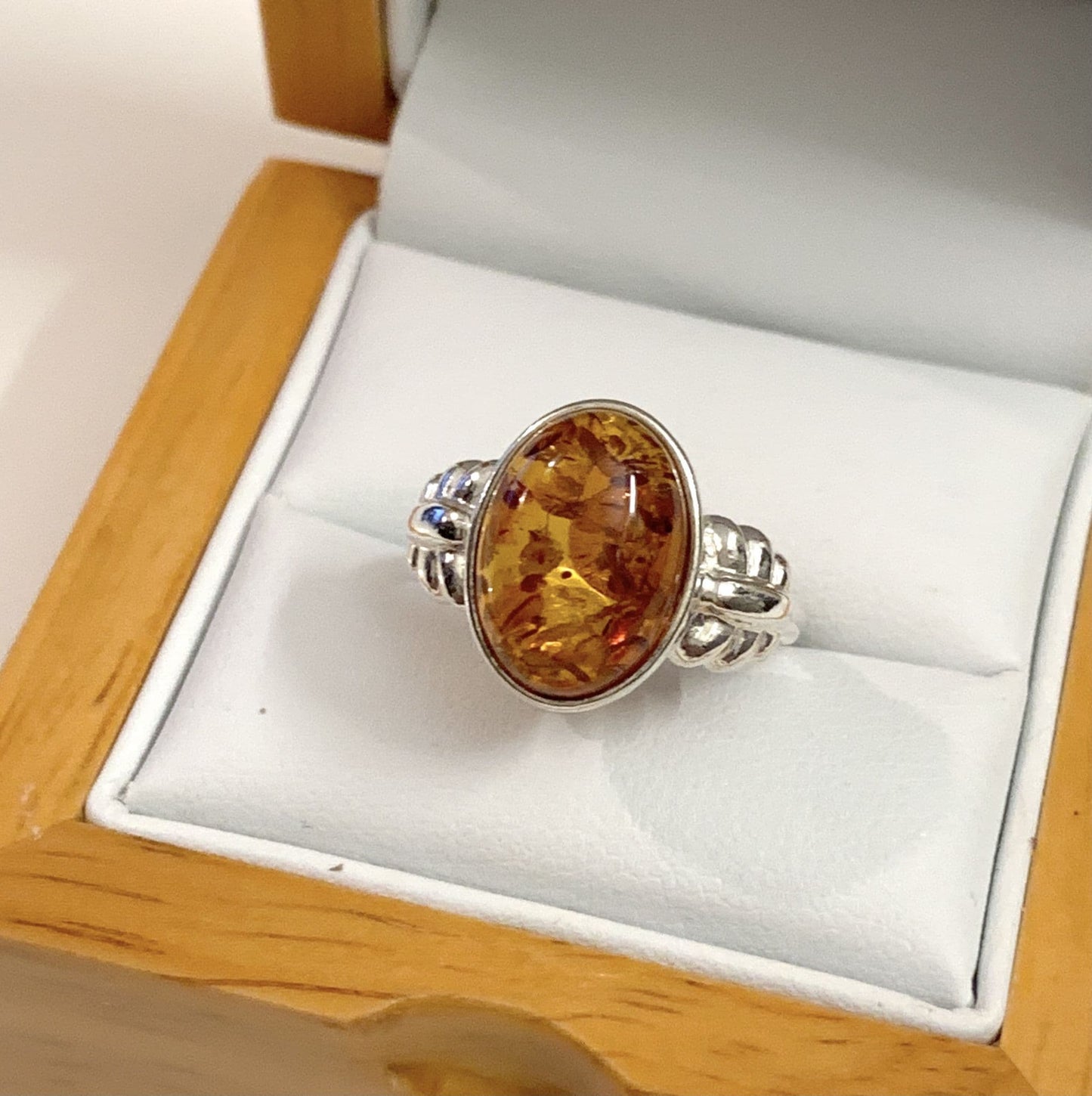 Oval Sterling Silver Orange Amber Ring Fancy Shoulders