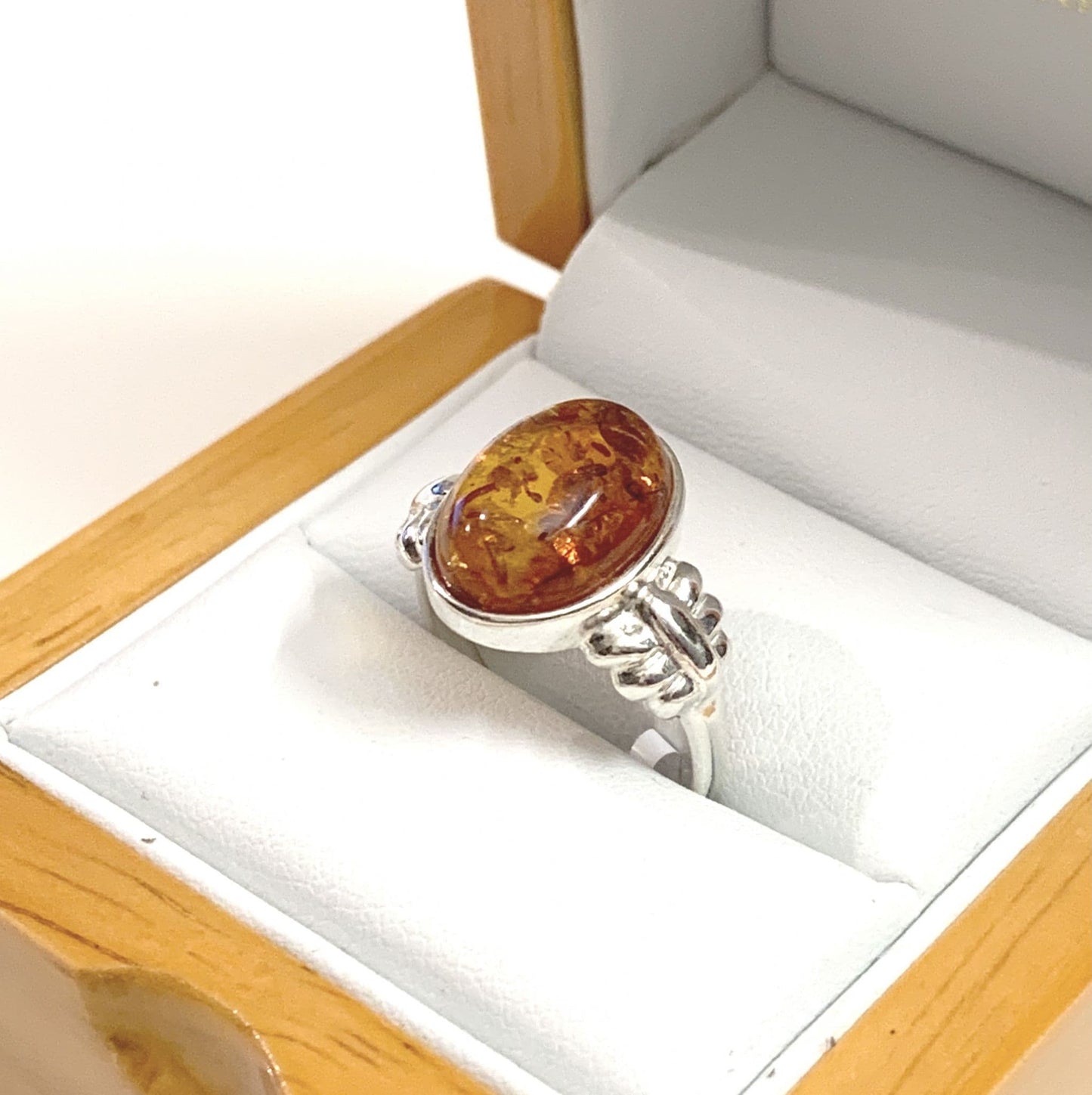 Oval Sterling Silver Orange Amber Ring Fancy Shoulders