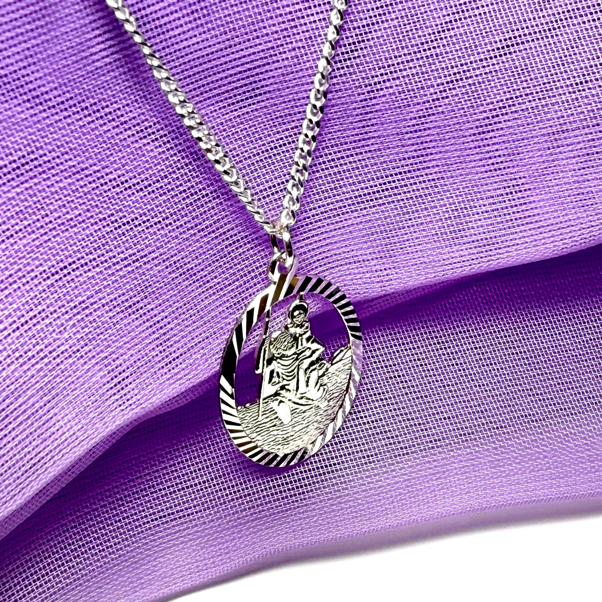 Oval St Christopher solid sterling silver pierced