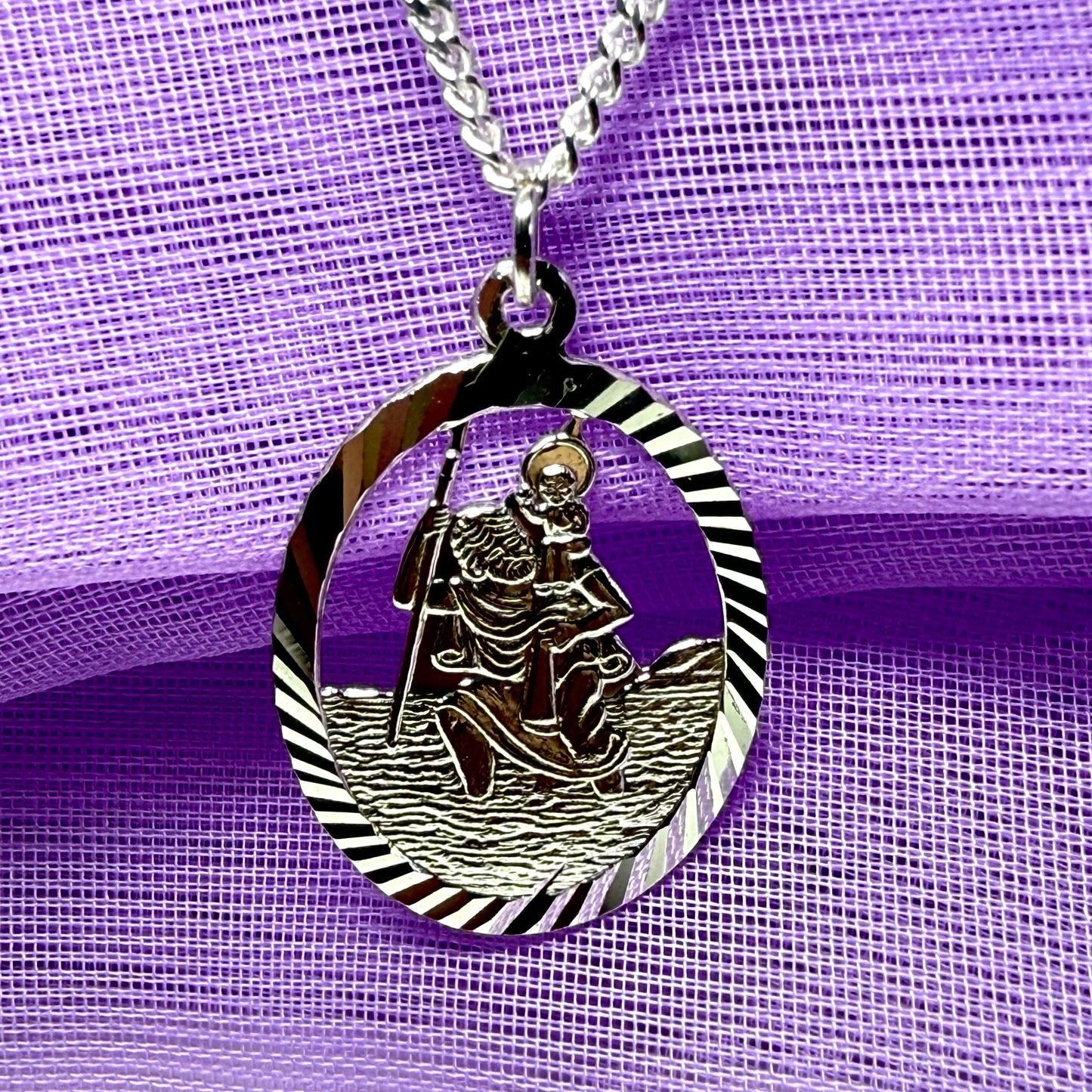 Oval St Christopher solid sterling silver pierced