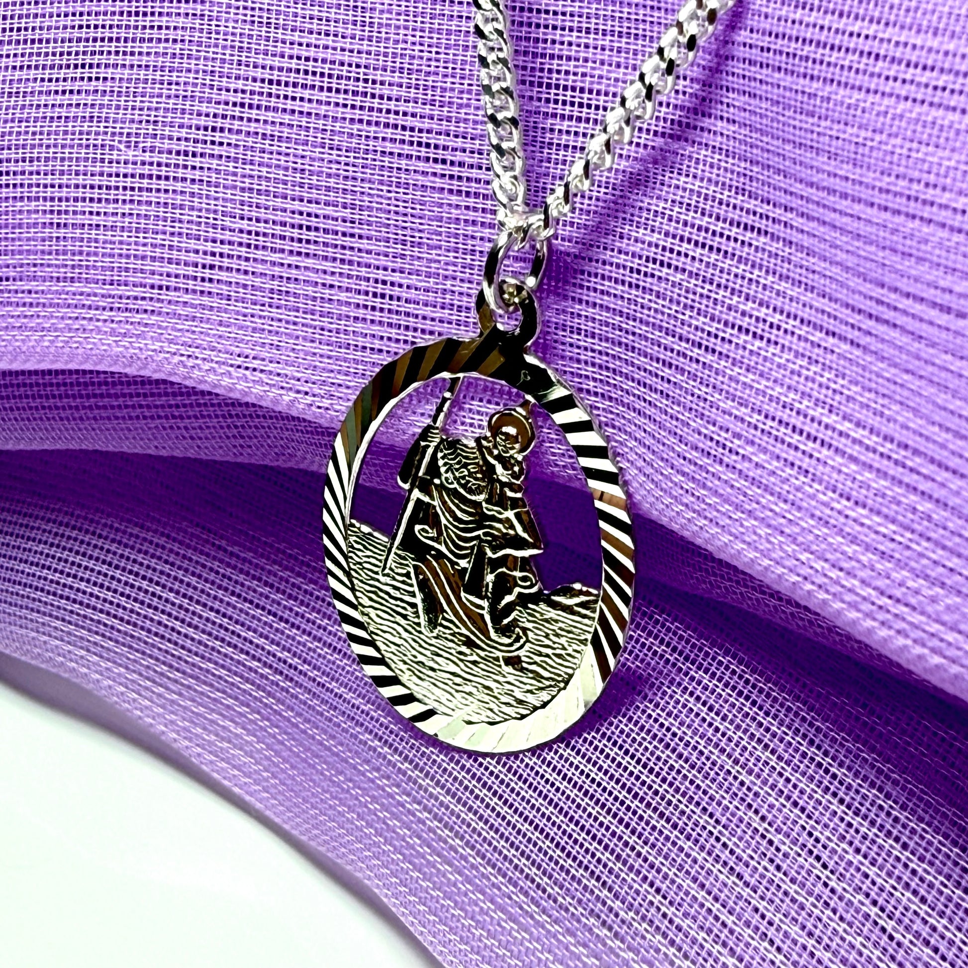 Oval St Christopher solid sterling silver pierced