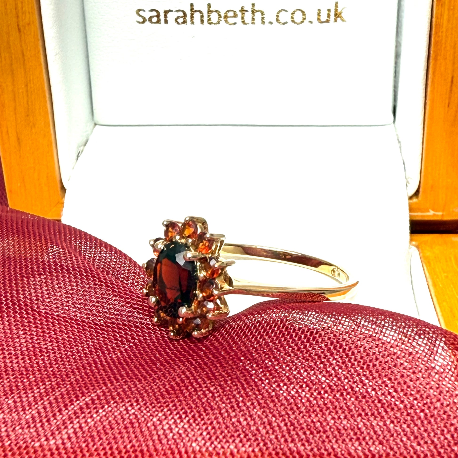 Oval real garnet cluster ring yellow gold