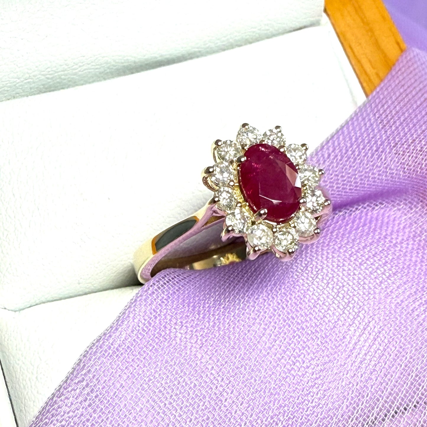 Oval red real ruby and diamond yellow gold cluster ring