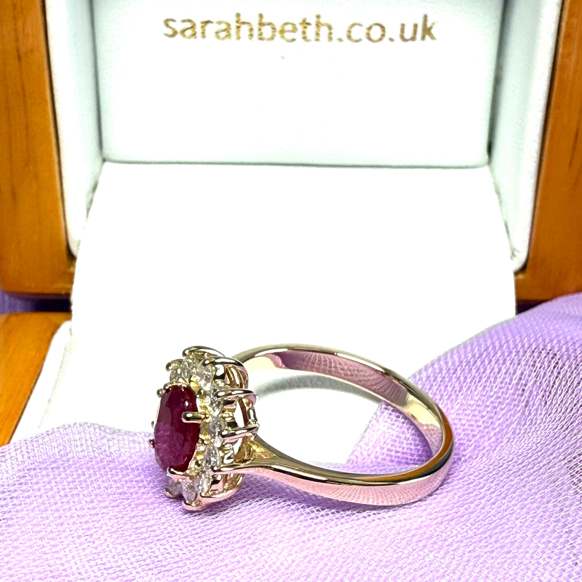 Oval red real ruby and diamond yellow gold cluster ring
