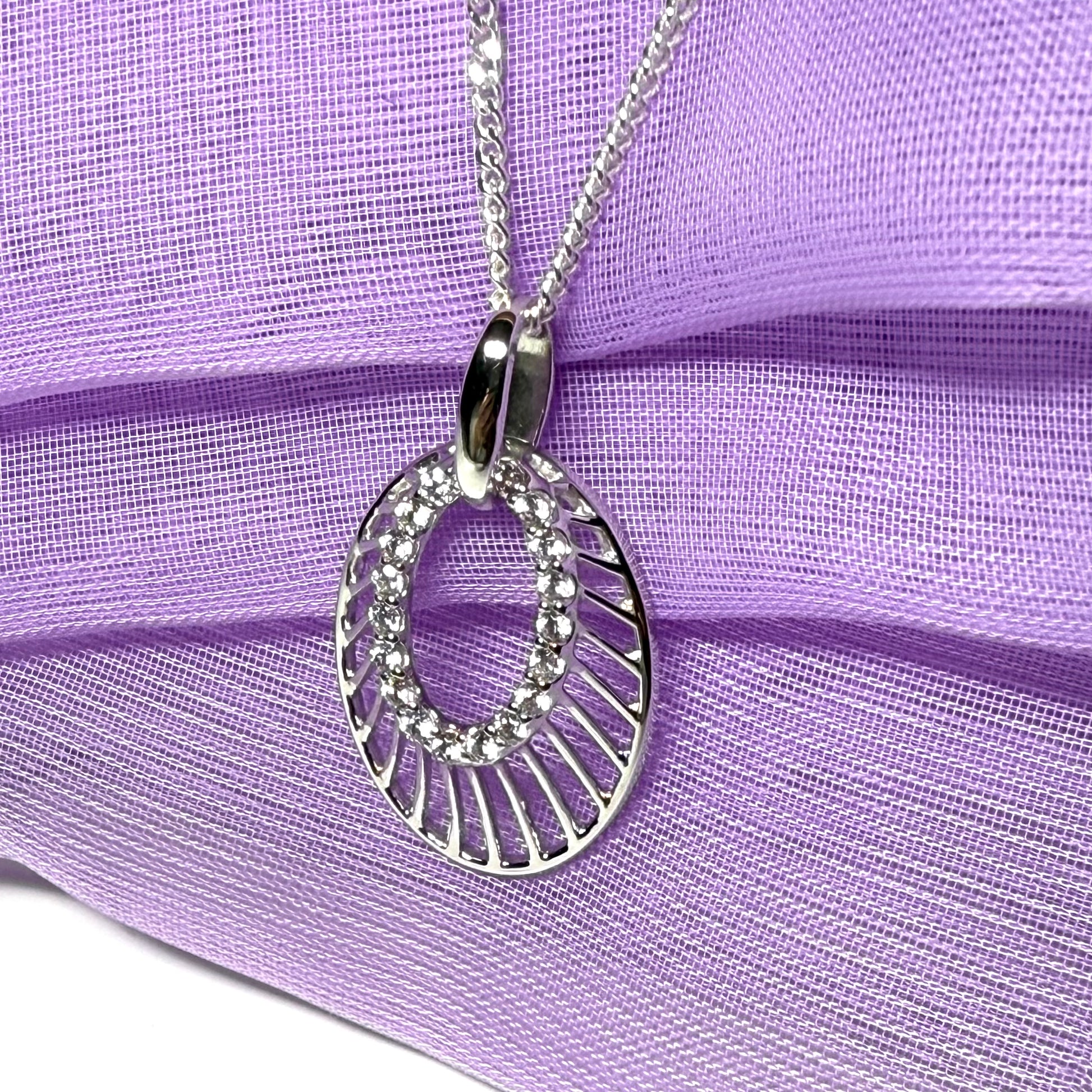 An oval shaped cubic zirconia sterling silver necklace