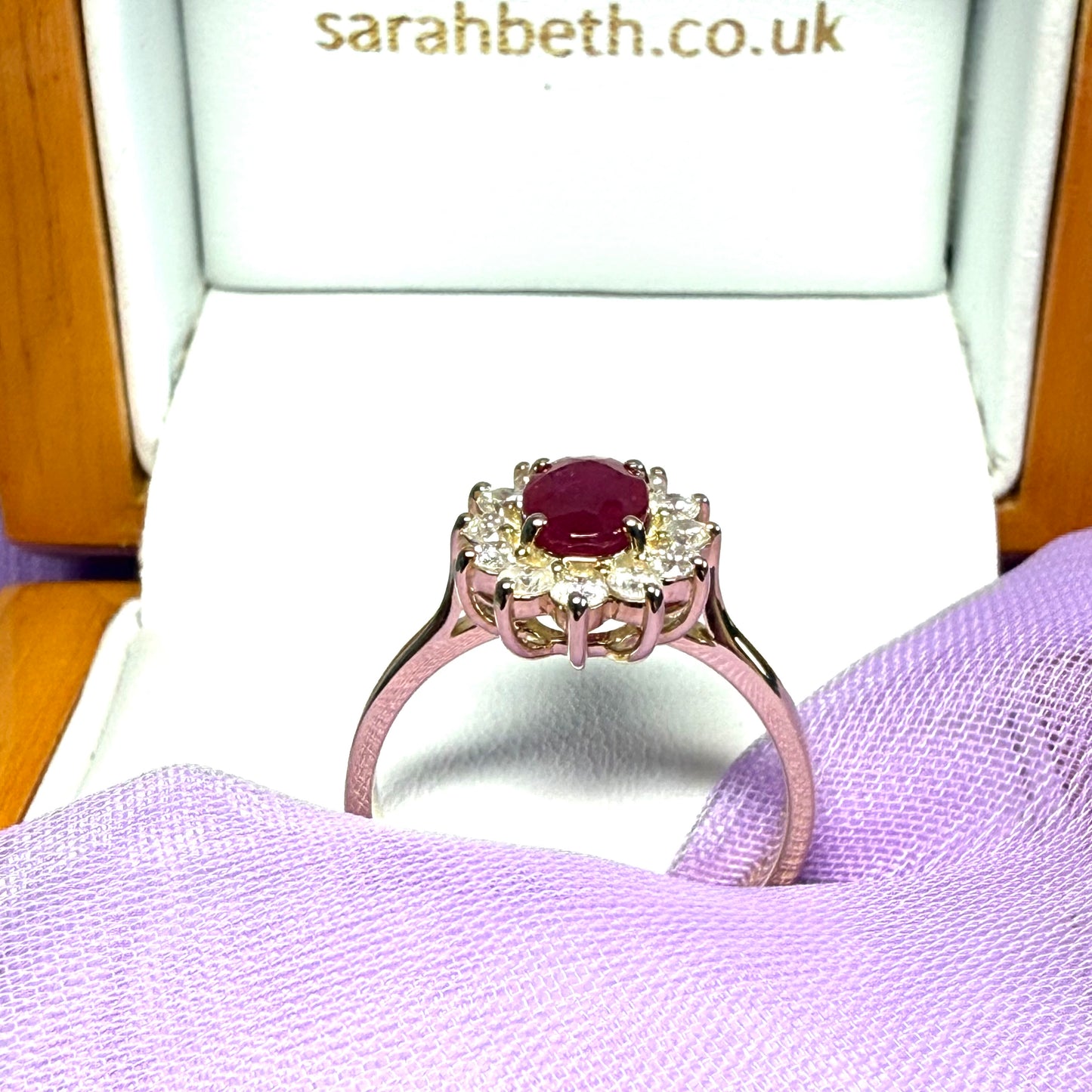 Oval red real ruby and diamond yellow gold cluster ring