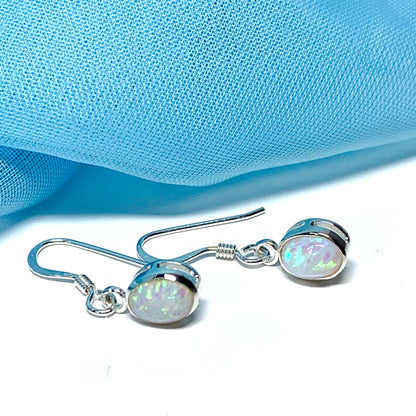 Oval sterling silver opal oval long drop earrings