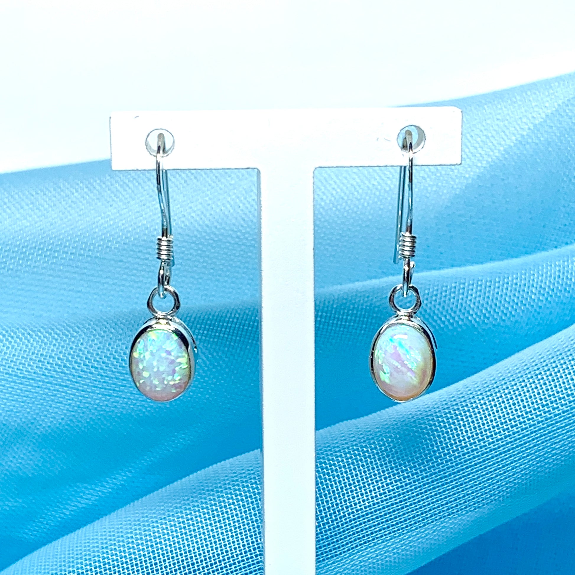 Oval sterling silver opal oval long drop earrings