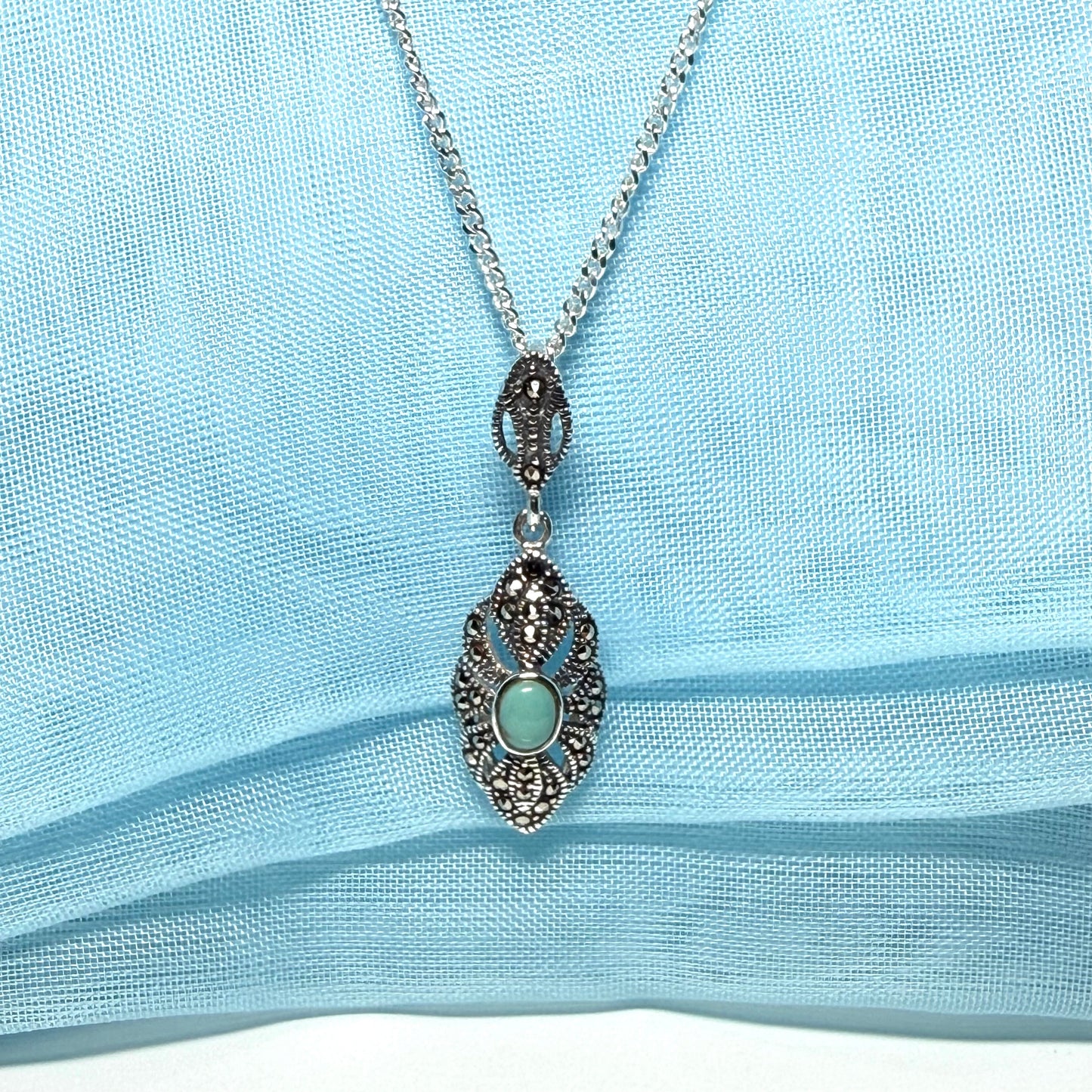 Oval turquoise and marcasite drop sterling silver necklace pendant