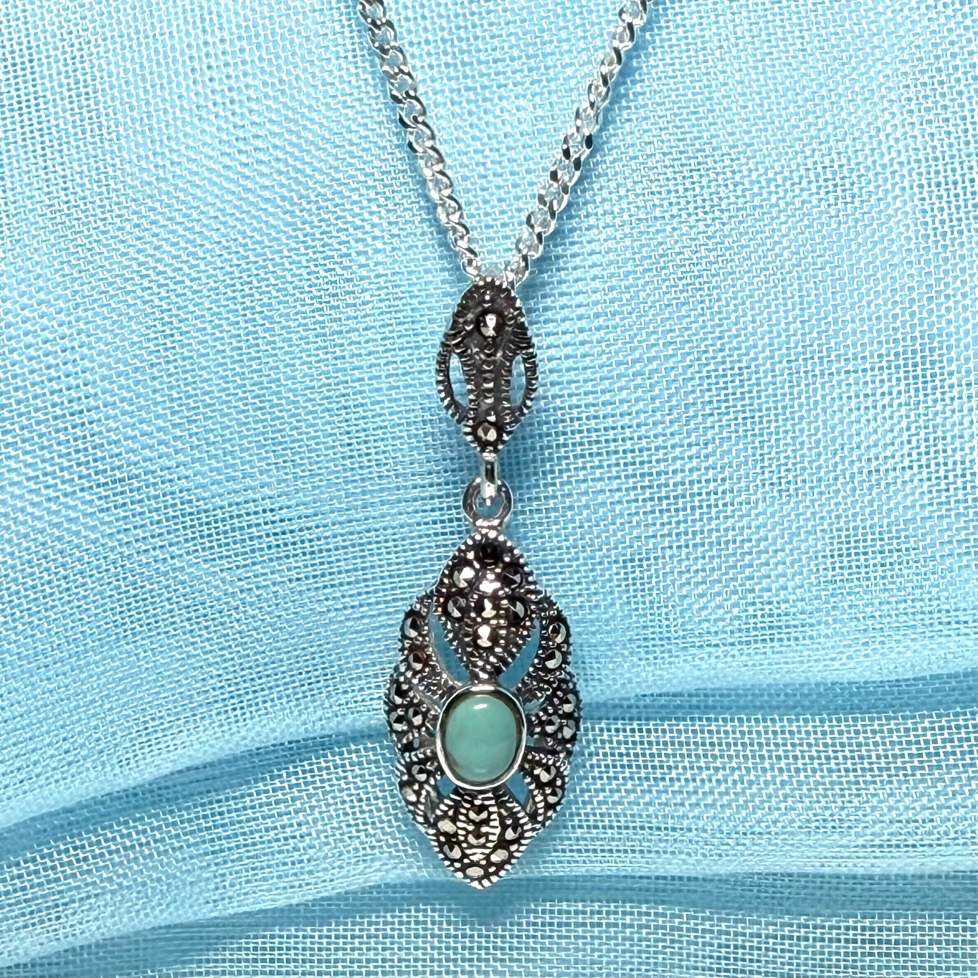Oval turquoise and marcasite drop sterling silver necklace pendant