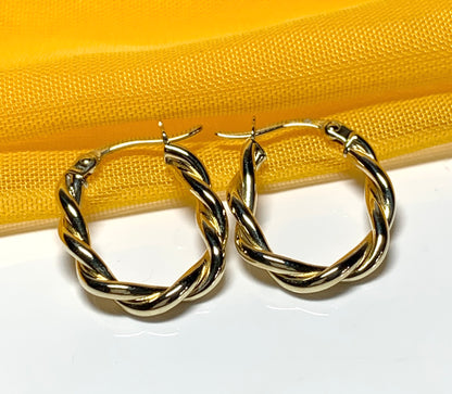 Oval hoop earrings yellow gold twisted