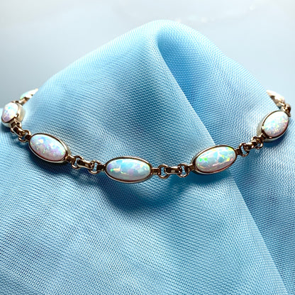 Oval opal yellow gold bracelet