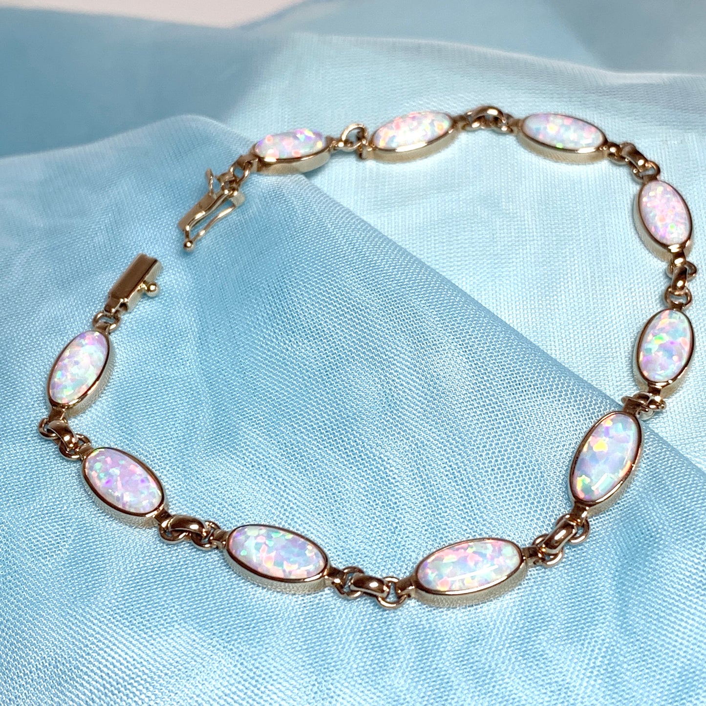 Oval opal yellow gold bracelet