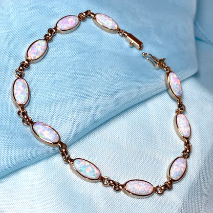 Oval opal yellow gold bracelet