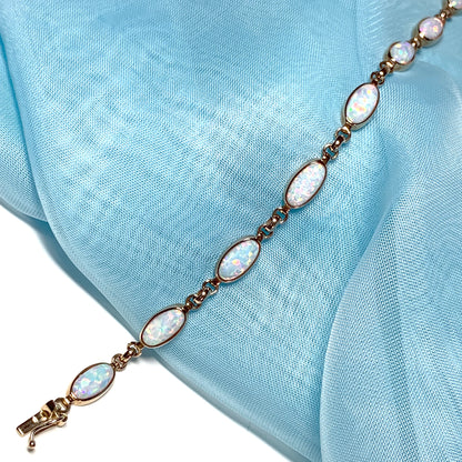 Oval opal yellow gold bracelet