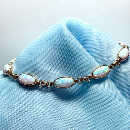 Oval opal yellow gold bracelet