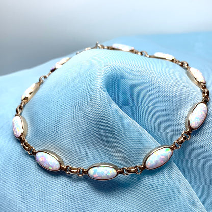 Oval opal yellow gold bracelet