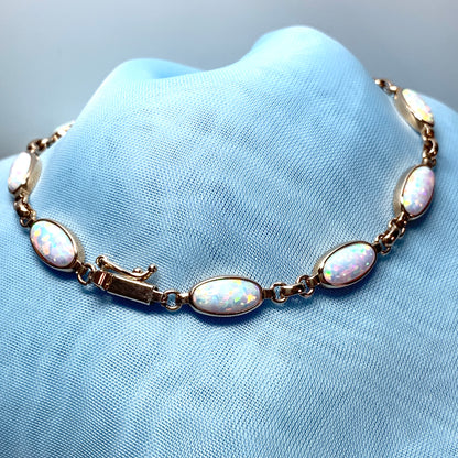 Oval opal yellow gold bracelet