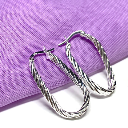 Oval patterned hoop earrings sterling silver