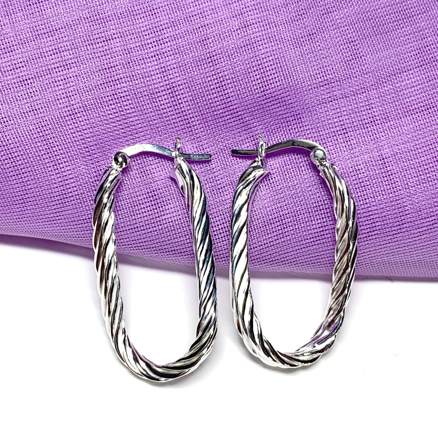 Oval patterned hoop earrings sterling silver