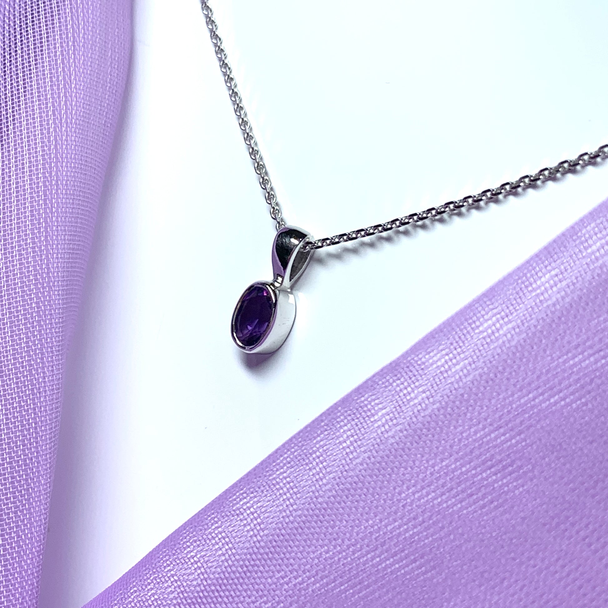 Oval purple amethyst white gold rubbed over necklace
