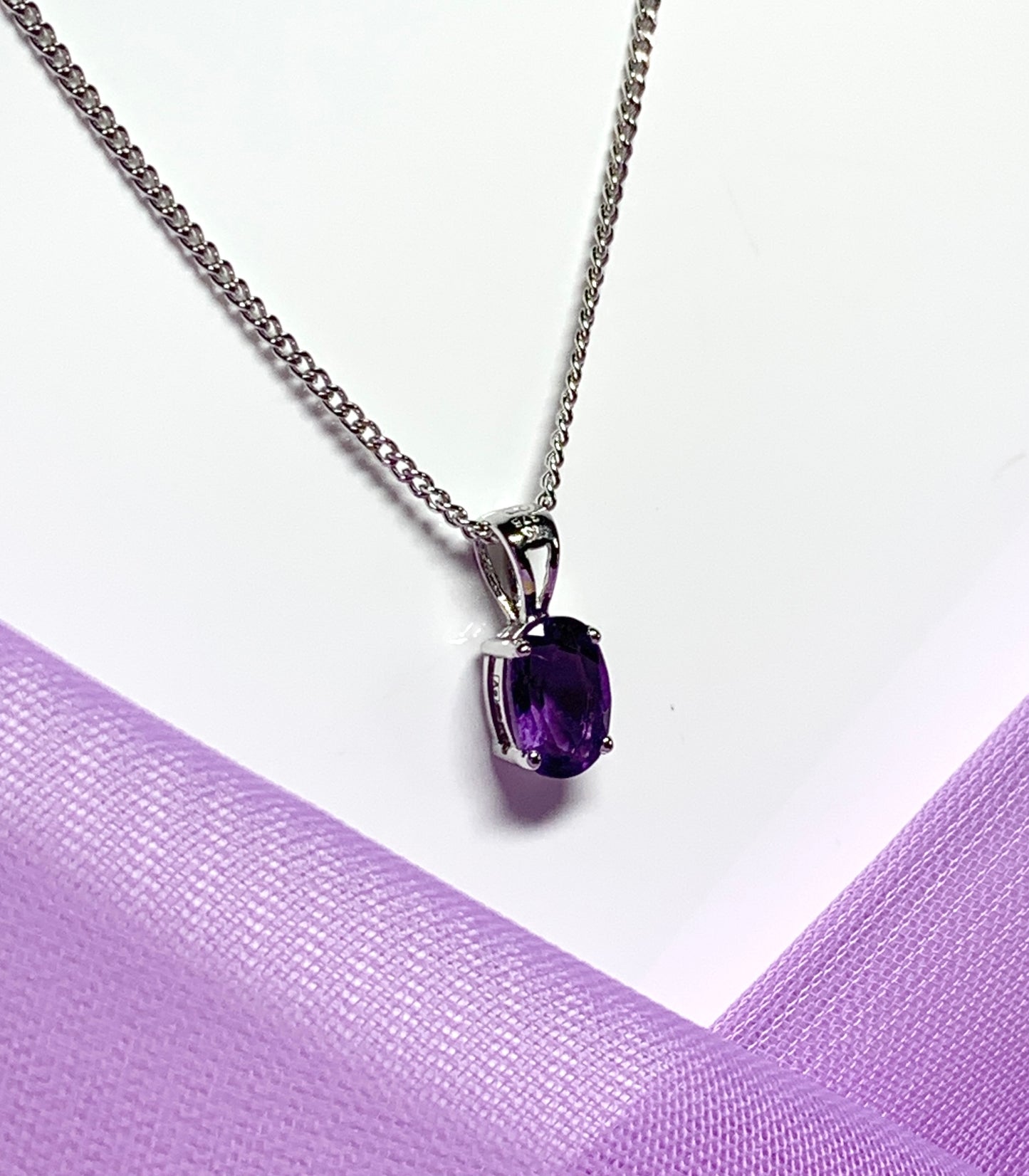 Oval purple amethyst white gold necklace