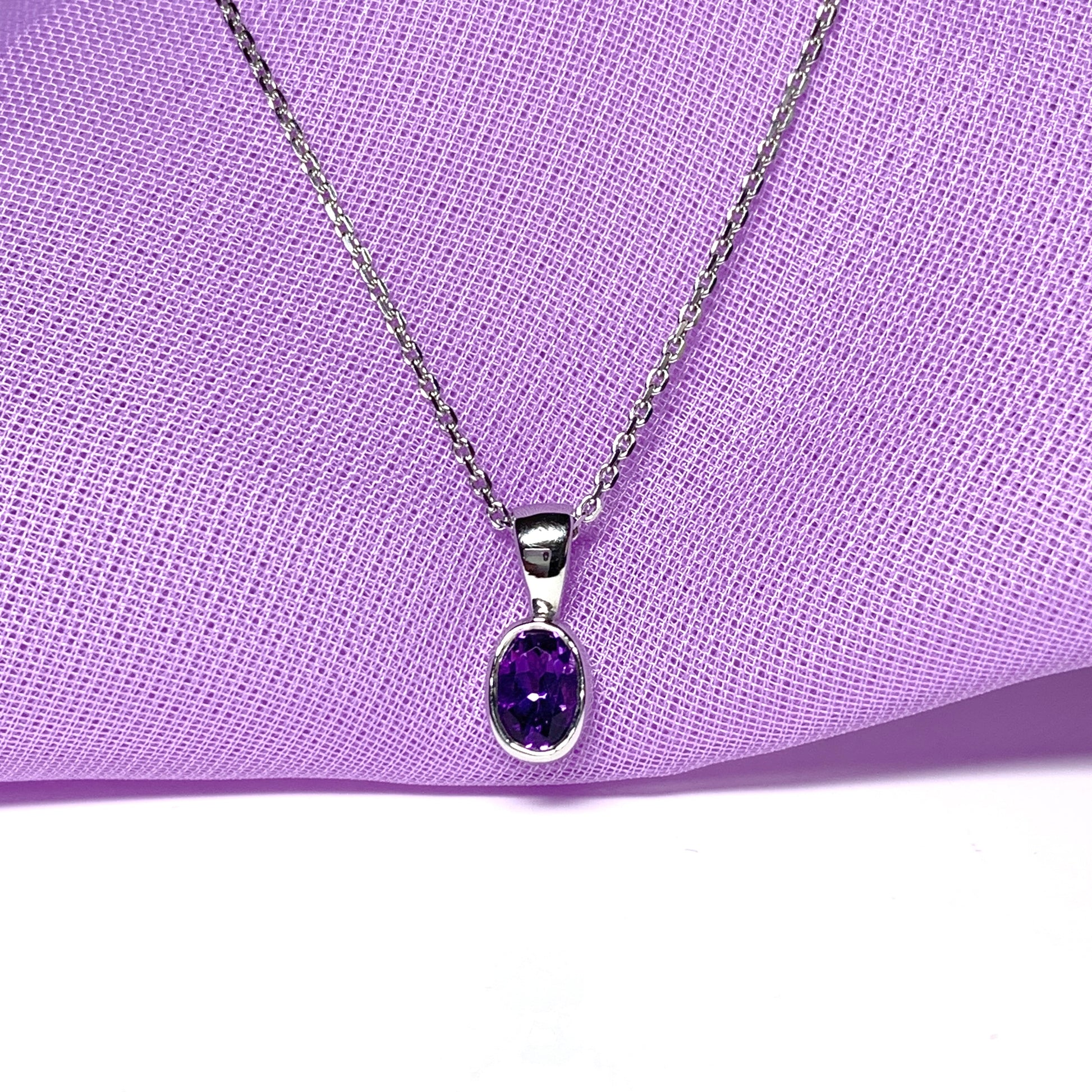 Oval purple amethyst white gold rubbed over necklace