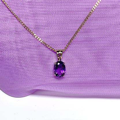 Oval purple amethyst yellow gold necklace