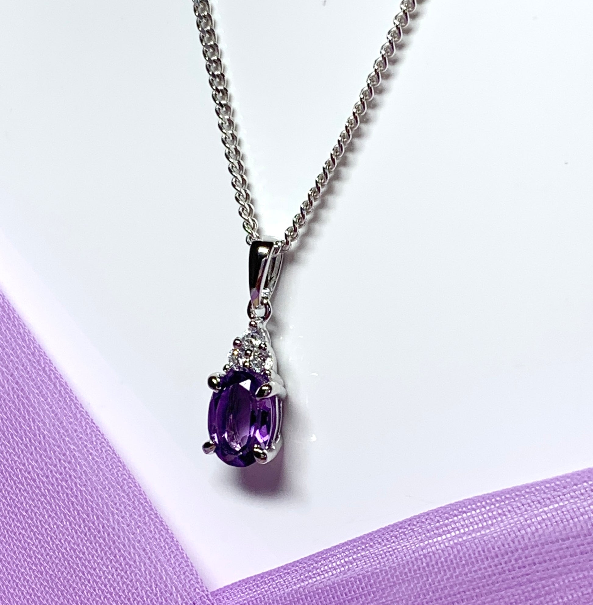 Oval real purple amethyst and cubic zirconia sterling silver necklace pendant