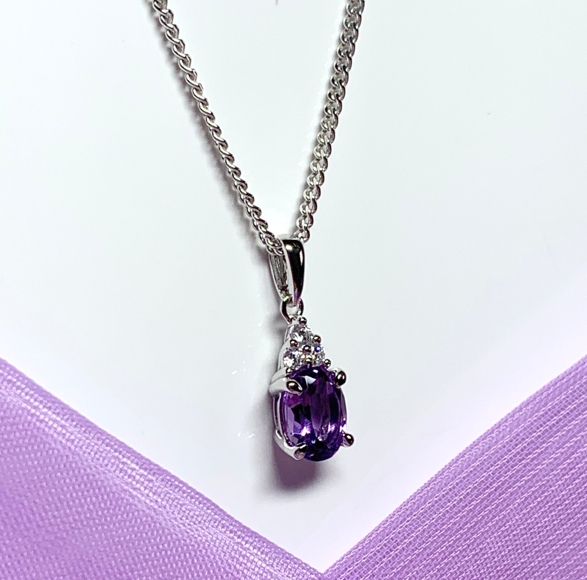 Oval real purple amethyst and cubic zirconia sterling silver necklace pendant