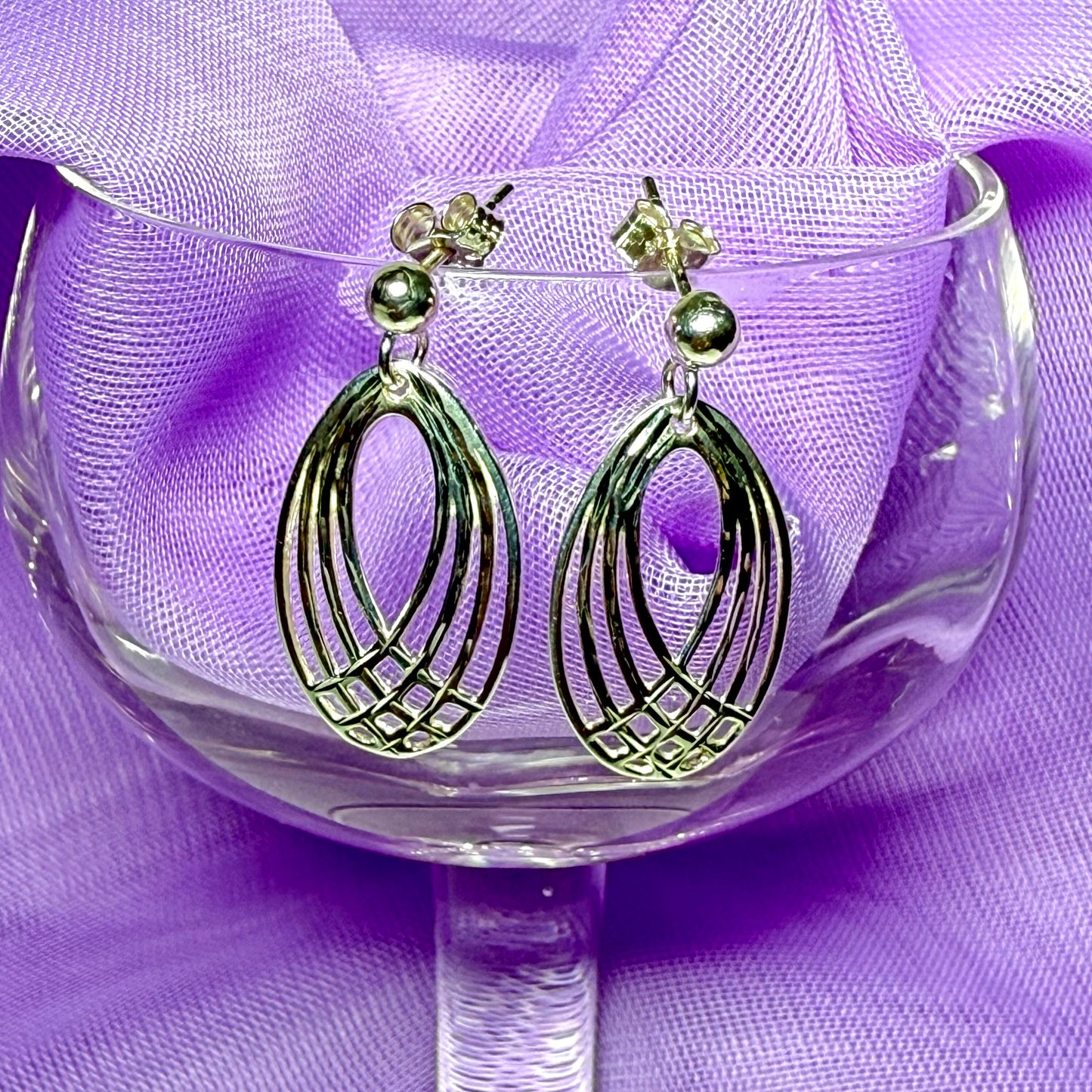 Oval shaped open drop earrings sterling silver