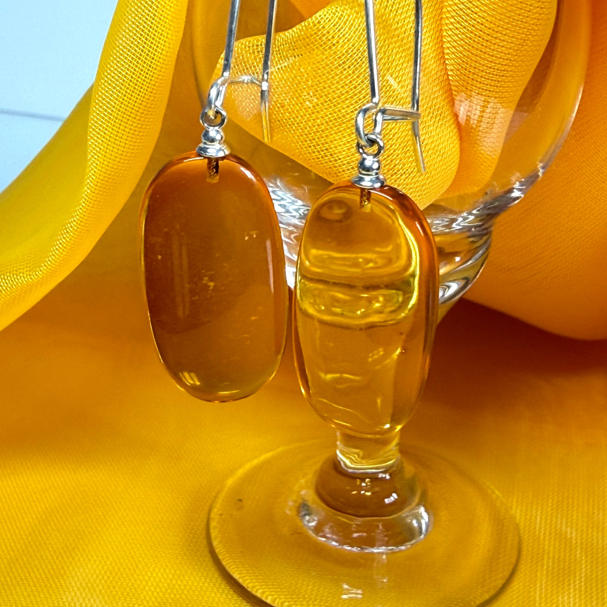 Pair of real amber drop earrings oval shaped sterling silver