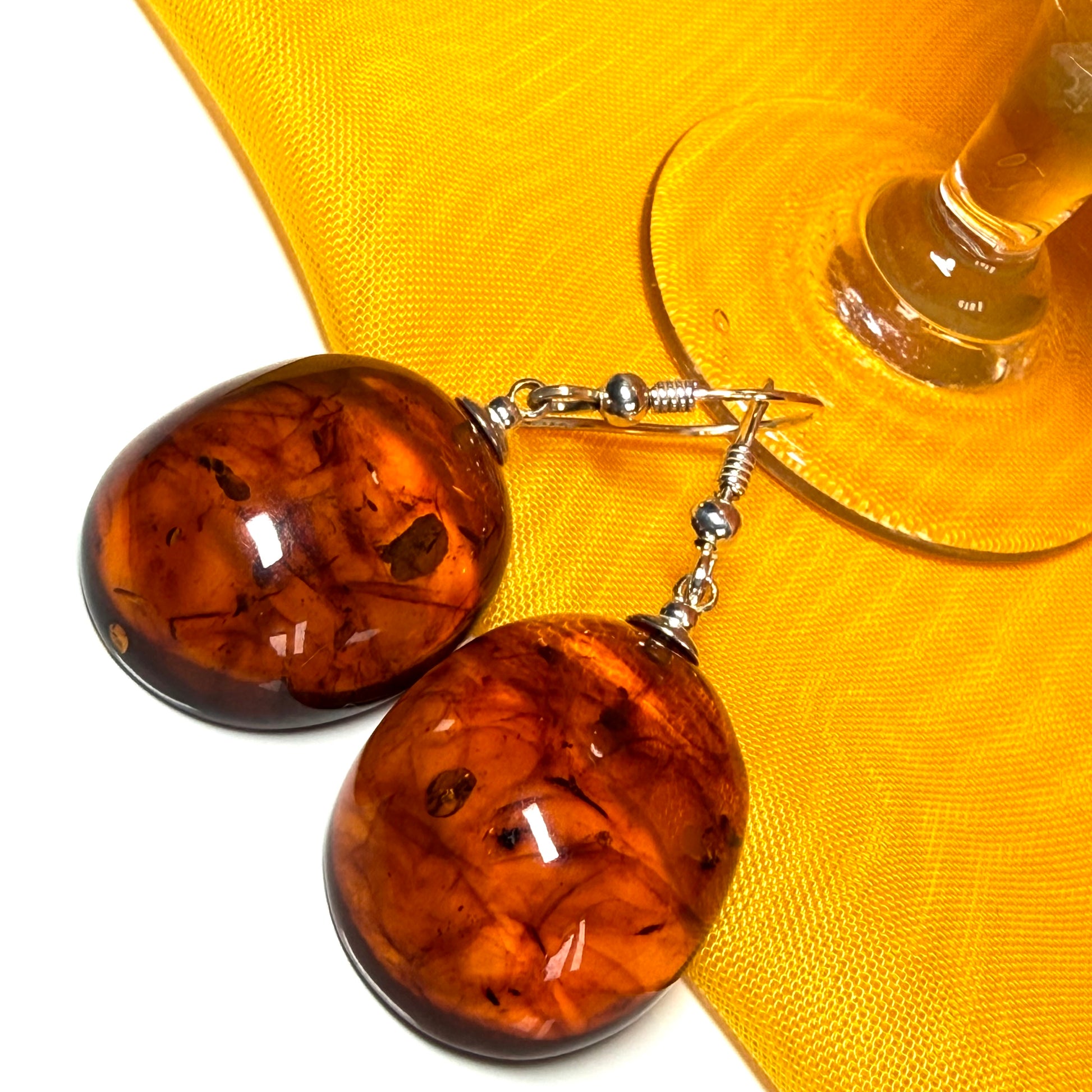 Pair of real amber drop earrings oval shaped sterling silver hooks
