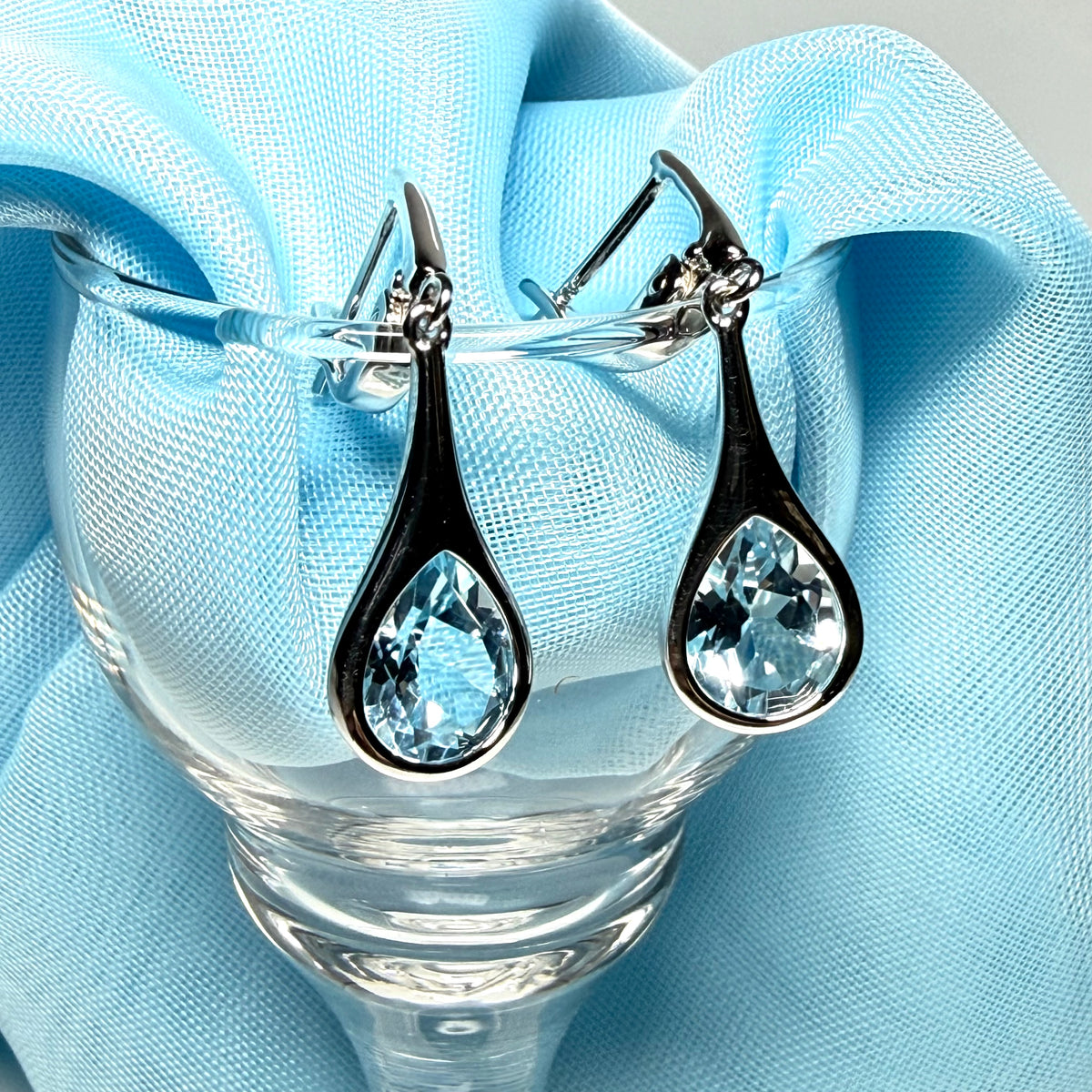 Real blue topaz sterling silver dropped earrings pear shaped stones