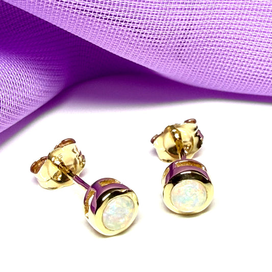 Pair of real opal earrings round yellow gold stud smooth rubbed over setting