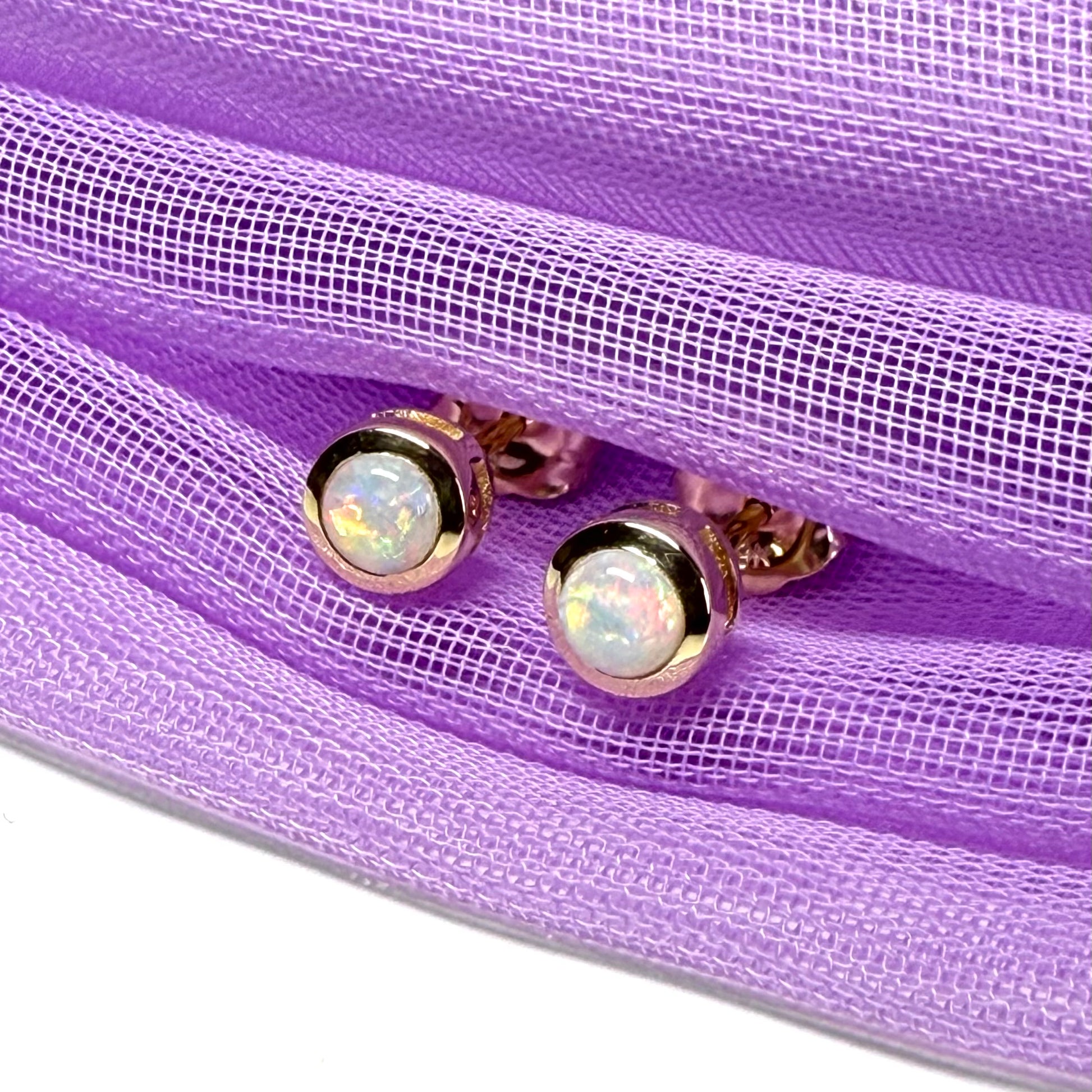 Pair of real opal earrings round yellow gold stud smooth rubbed over setting