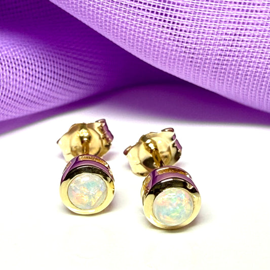 Pair of real opal earrings round yellow gold stud smooth rubbed over setting