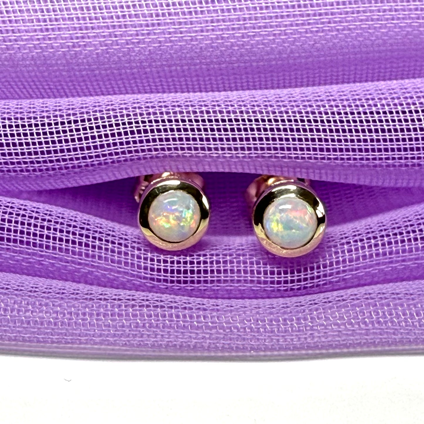 Pair of real opal earrings round yellow gold stud smooth rubbed over setting